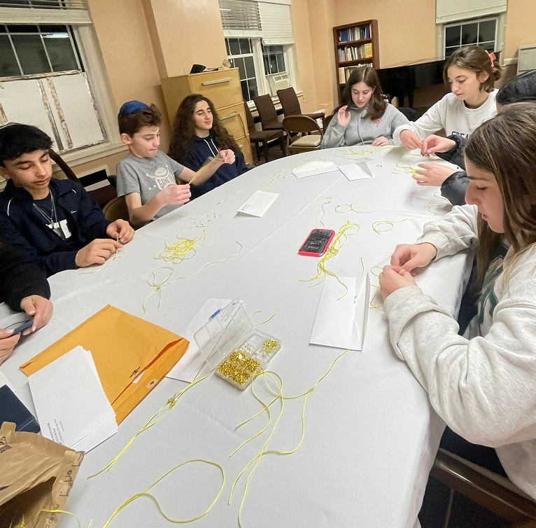 Making bracelets for Israel